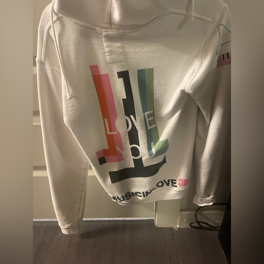 Free city white zip up sweatshirt with colorful design on the back